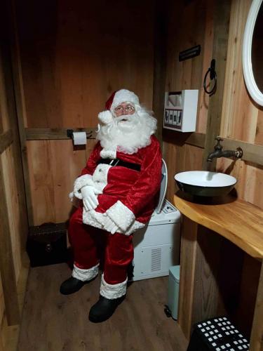 u - Resize - Santa tries out the Incinerating Toilet